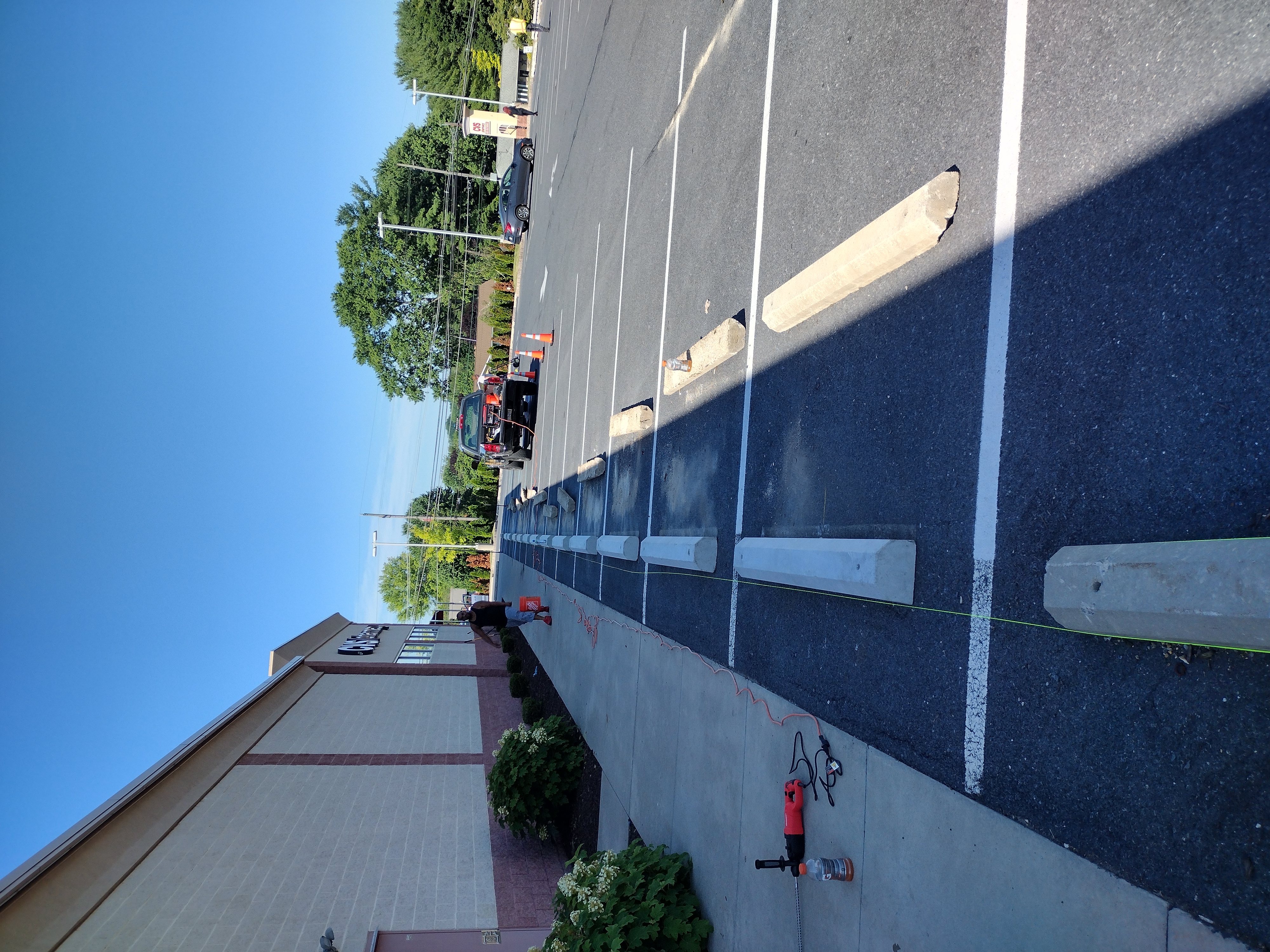 Wheel stop replacement at a CVS Pharmacy parking lot